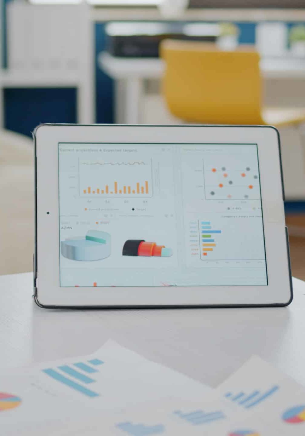 Close up of tablet and papers with data charts on desk used by workmates for business development. Corporate colleagues working on project presentation for management and marketing strategy SSUCv3H4sIAAAAAAAAA01Rwa7bIBD8F85GBQwG5/gOvVXq/amHBdYJesREBvfpKfK/d504bTmxO8PsMnNnKbIT01rEYRosN8YHrpUO3BvtuDRGBOvQDL1jHYvQkJ1kr5wetFVKSTMIOh3zUFNgpztLOa+1LdBSmdmJkAXniMvjijG1siTIVG0dqw3aWrHSM6oCaZ8JfdQvvff73qcF39aaZqz12/c0wxyQlqmrJ+AnlltGtnUv5tF44T9SDZgzzFjW+h/tL4FtvzoGZ5zD177Itm+cER57vTM1gcMxRO4n9FxHN3JQOFDplJOTASkDSQ0i9La3Ezd6dFxbZ7jToLh0YvTopgBSEM0aPw7CaK56QzQpBaeG5DZaK8KAQWsgmnbGIgrFp9FErk3wfJzAc6ut9MSMYtyHjjqAlUhR9WNPalPkYEnNSaWlhkFa7Bl97uOz4XI9bC7tsqdBNpR1bsvX04pcyg082XaaIFfs2AVqJUI8GvTwtqSQ5vMRFmVcrs/7XNru1cPRVsJHiseoZ76XRN19zp2tt1wgYjzg1V9Ta69ywd8JP/+xt237AxDRzFKdAgAA